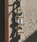 Chayana Moon Phase Mother of Pearl Wind Chime - Fair Trade Decor HME stock line La Vie Bien Chayana Moon Phase Mother of Pearl Wind Chime - Fair Trade Decor