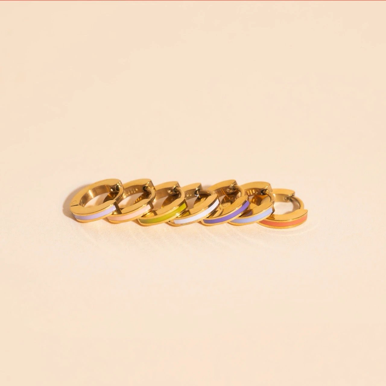 Color Tiny Huggie Hoop Earrings by Oh Clementine