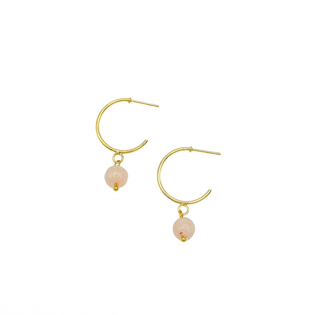 Conch Shell earrings by Alegria Accessories Inc