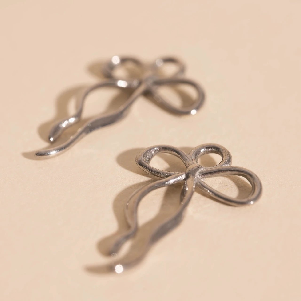 Dainty Bow Huggie Hoop Charms by Oh Clementine