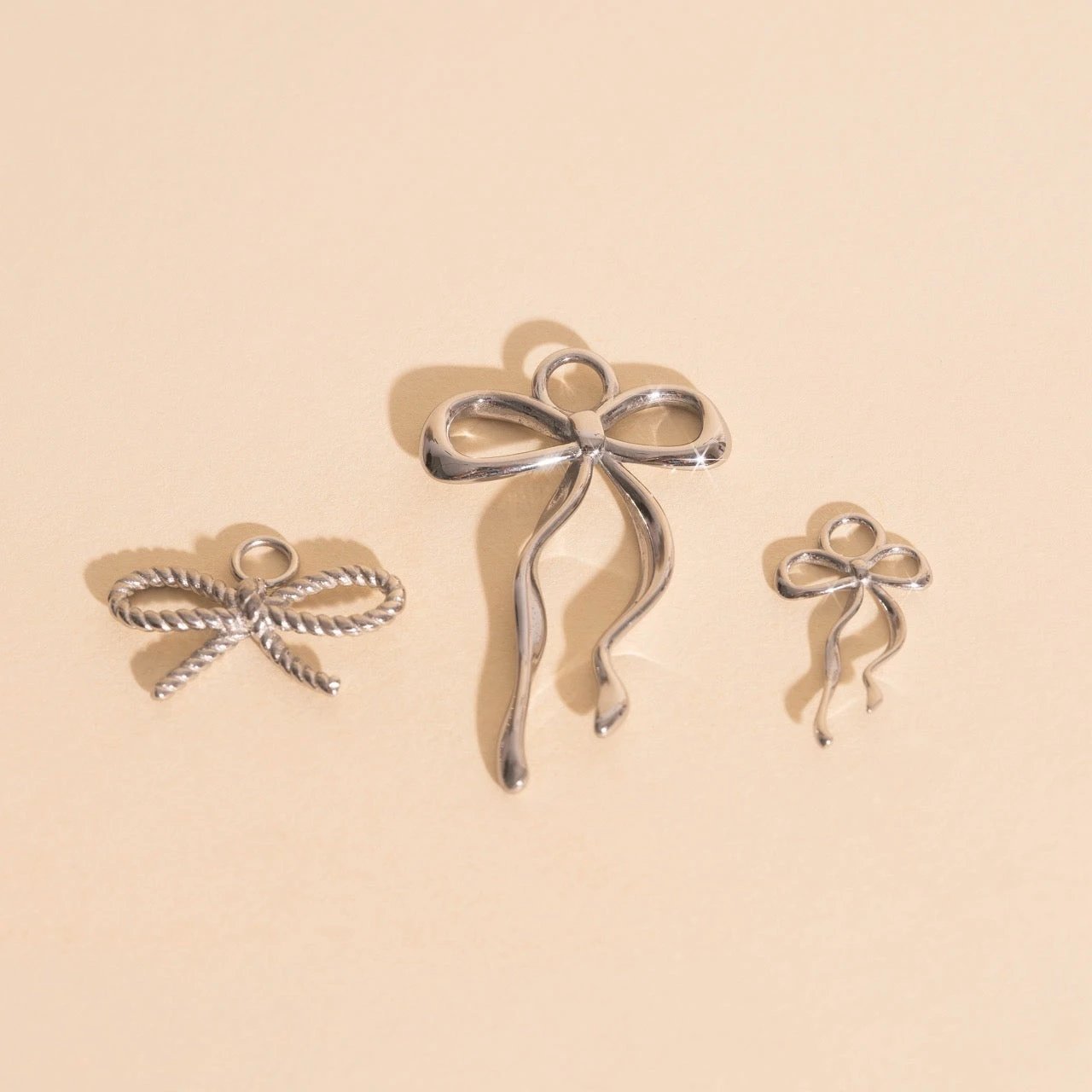 Dainty Bow Huggie Hoop Charms by Oh Clementine