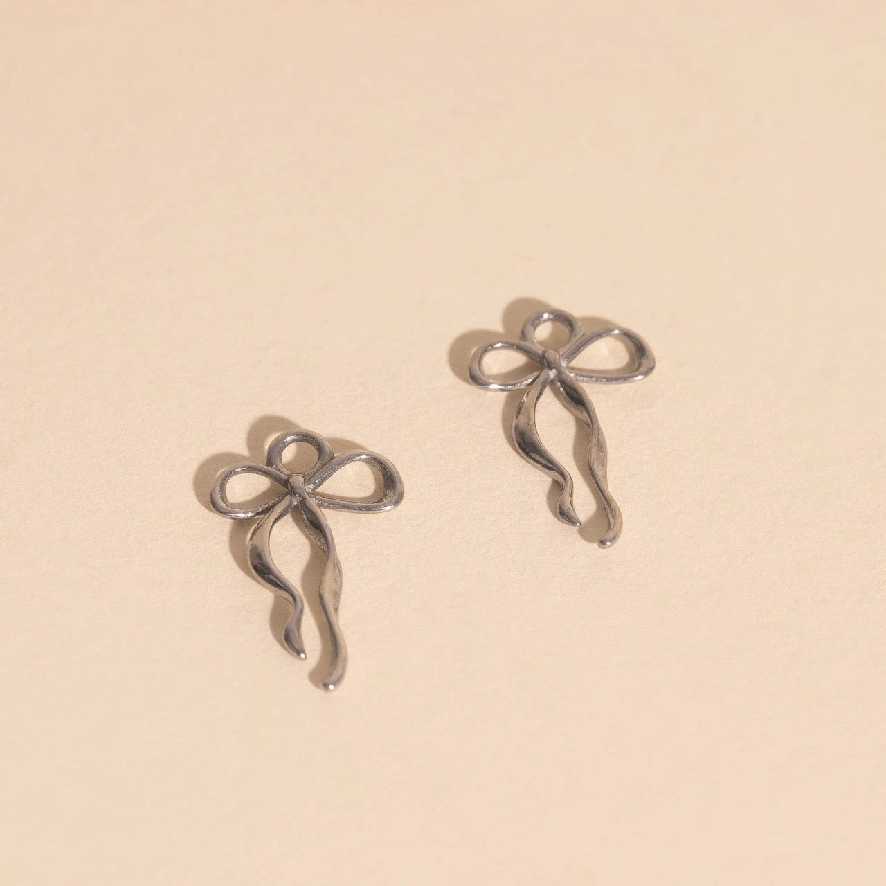 Dainty Bow Huggie Hoop Charms by Oh Clementine