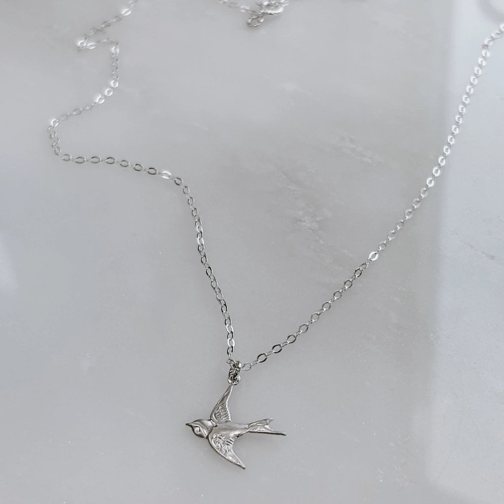 Dainty Flying Swallow Bird Necklace by Derive Jewelry