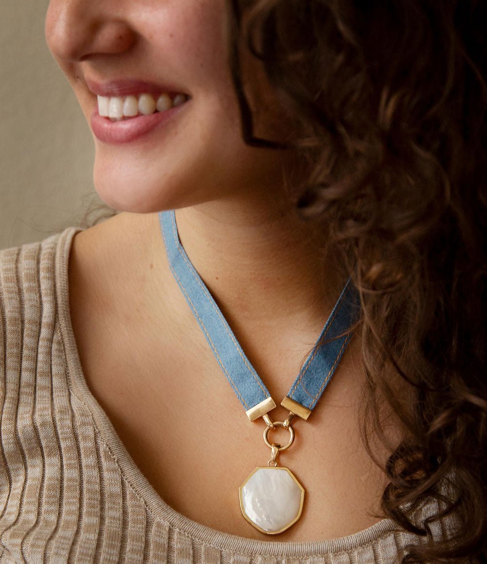 Blue Denim Dreams White Mother of Pearl Ribbon Golden Pendant Necklace by Barse Jewelry