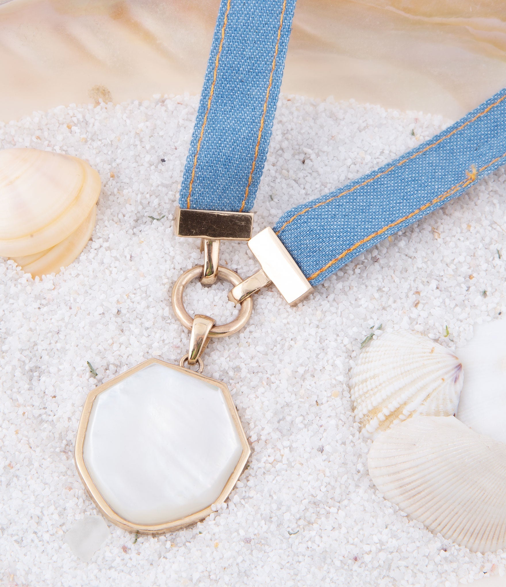 Blue Denim Dreams White Mother of Pearl Ribbon Golden Pendant Necklace by Barse Jewelry