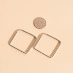 Diamond Rounded Huggie Hoop Earrings by Oh Clementine