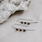 Ember Glow Garnet Threader Earrings by Derive Jewelry
