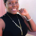 Empowering pearl and gold chain y necklace with tassel detail by Alegria Accessories Inc