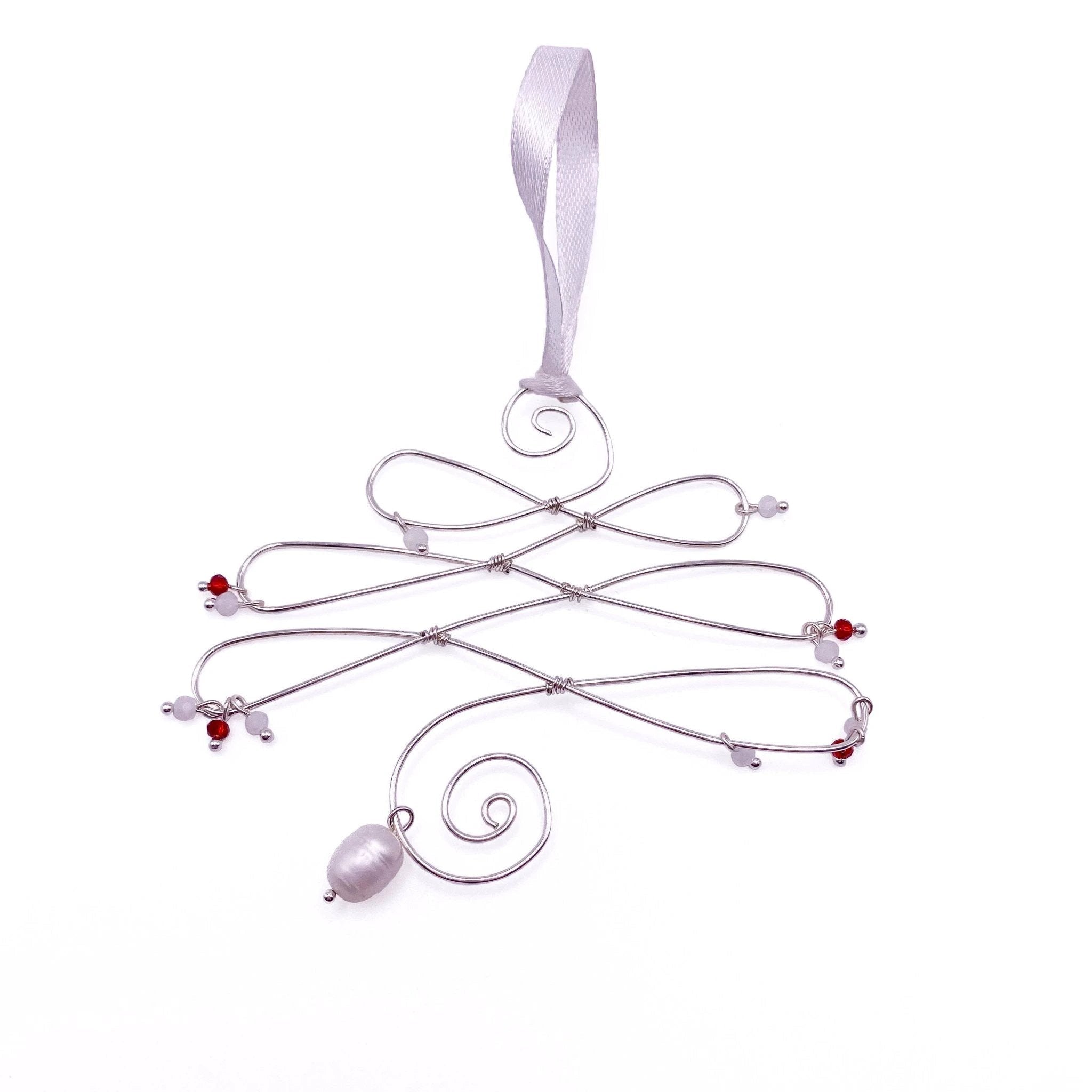 Fa-la-la silver ornament by Alegria Accessories Inc