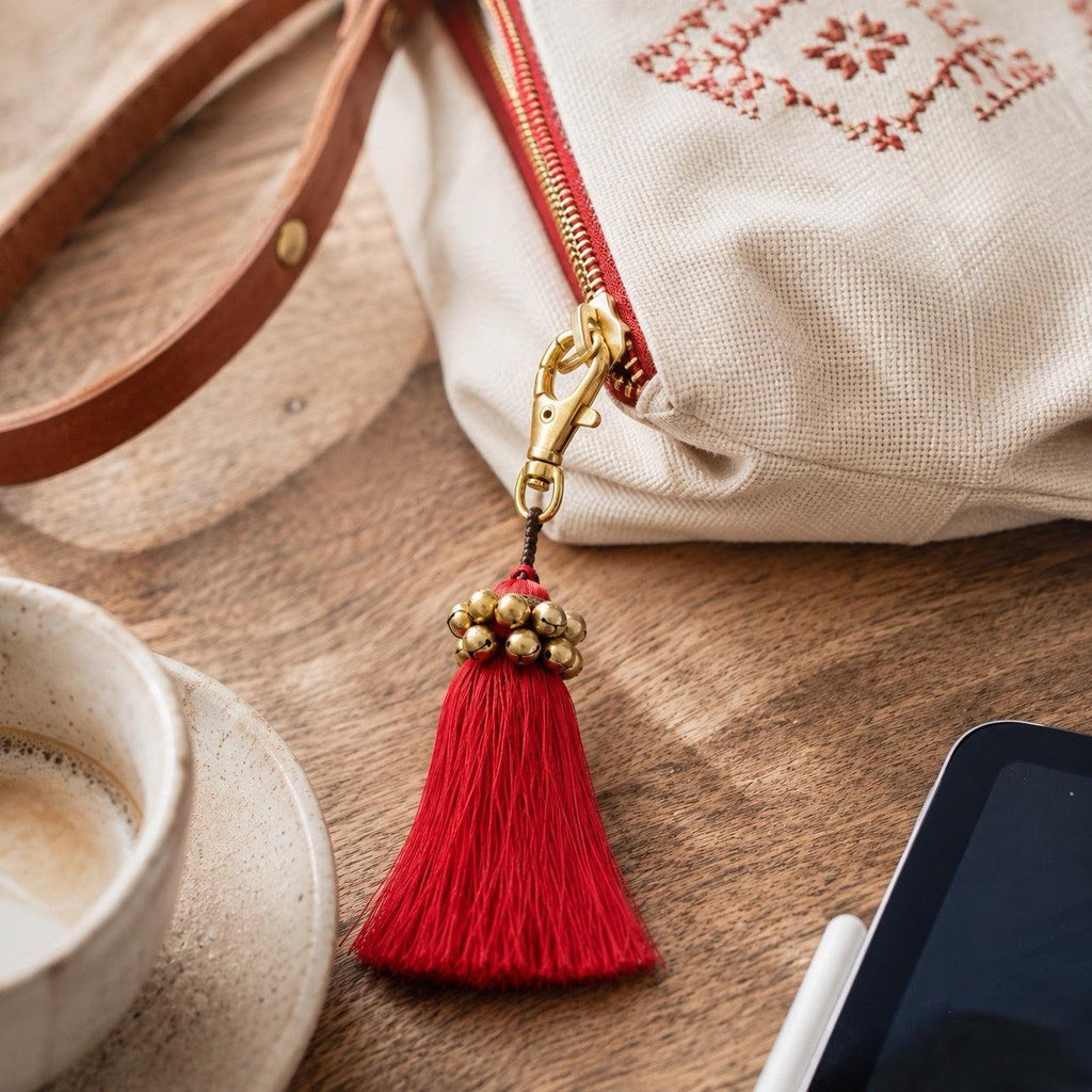 Fair Trade Cotton Tassel Zipper Pull with Bells | Handmade Keychain or Bag Charm from Thailand Bag Charms La Vie Bien Fair Trade Cotton Tassel Zipper Pull with Bells | Handmade Keychain or Bag Charm from Thailand