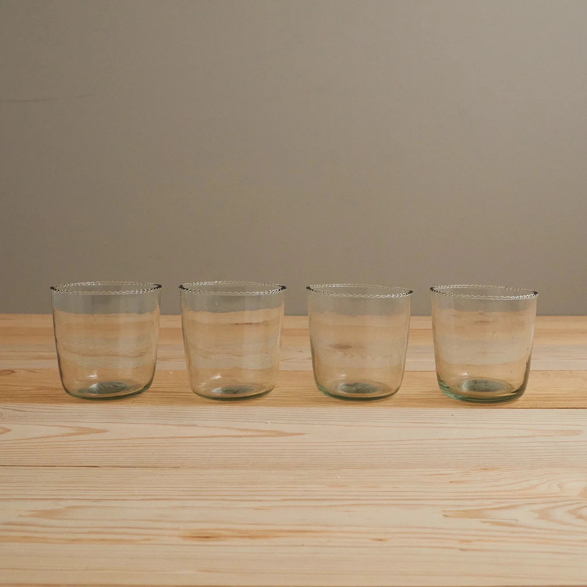 Ruffle Rocks Clear Drinking Glass by White Cliff Studio