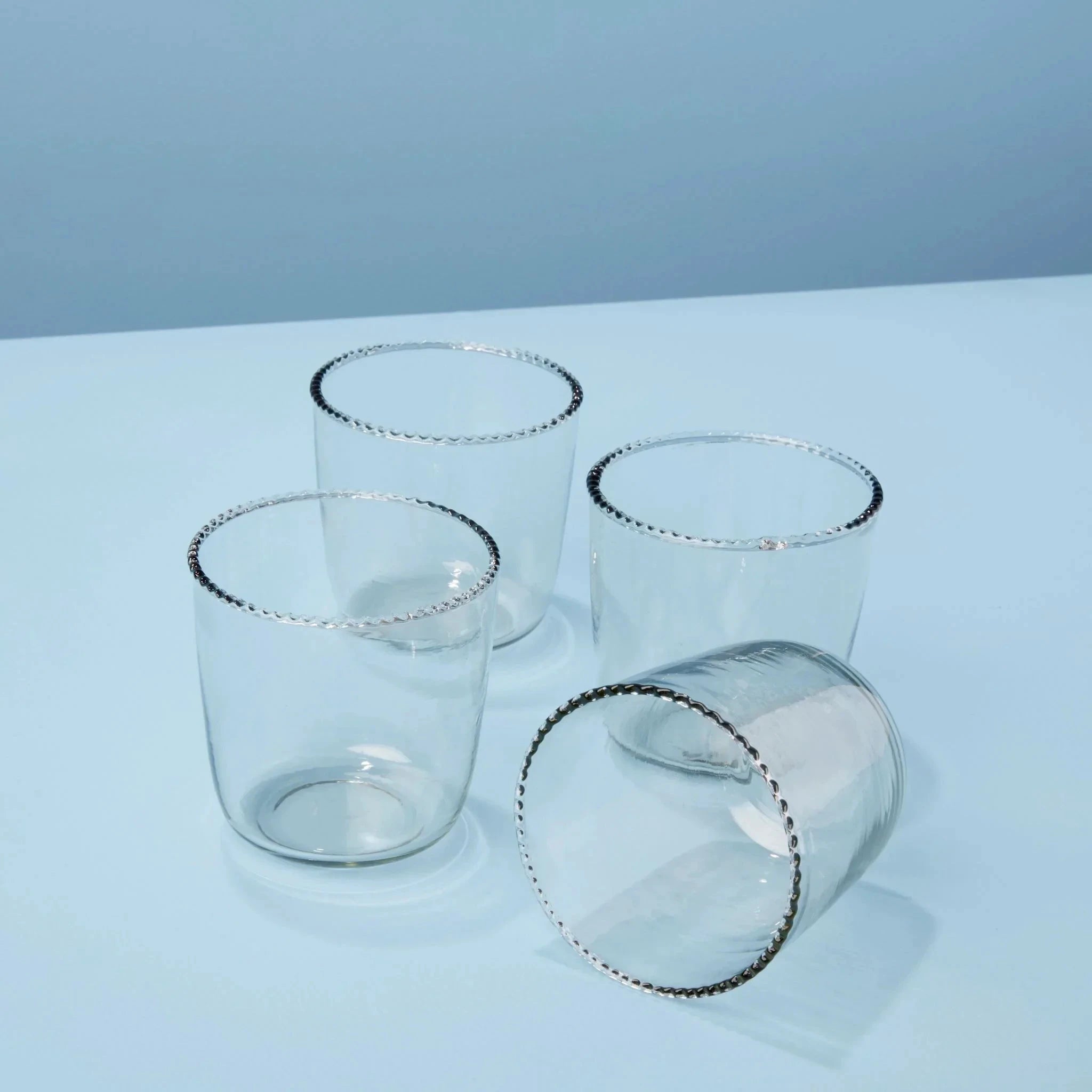 Ruffle Rocks Clear Drinking Glass by White Cliff Studio