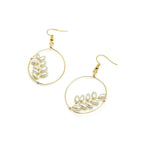 Flourish gold earrings by Alegria Accessories Inc