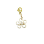 Flower gold charm by Alegria Accessories Inc