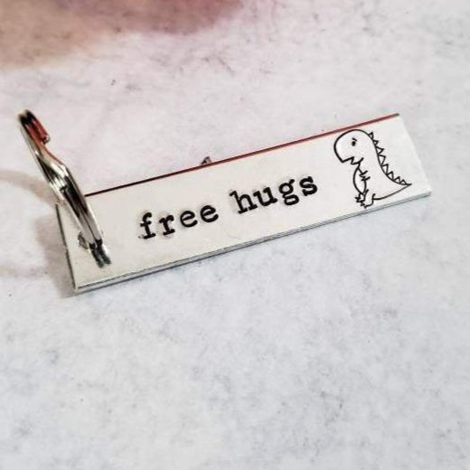FREE HUGS T - Rex Bar Keychain Key Chain La Vie Bien FREE HUGS T - Rex Bar Keychain