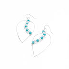 Frozen earrings by Alegria Accessories Inc
