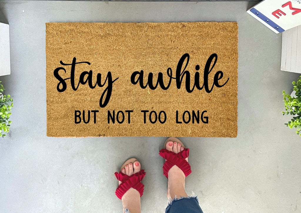 Funny Doormat - Stay Awhile But Not Too Long by Nickel Designs Custom Doormats