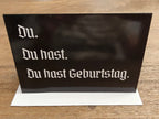 German Birthday Gift Box | Funny German Gift Set | Auf Deutsch Bitte Tee + Nein Dad Hat + Du Hast Geburtstag Card Bundle Gift Sets La Vie Bien German Birthday Gift Box | Funny German Gift Set | Auf Deutsch Bitte Tee + Nein Dad Hat + Du Hast Geburtstag Card
