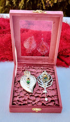 German Silver Combo of Koyari Haldi Kumkum Dani with Peacock Feather Stick In Velvet Box La Vie Bien German Silver Combo of Koyari Haldi Kumkum Dani with Peacock Feather Stick In Velvet Box