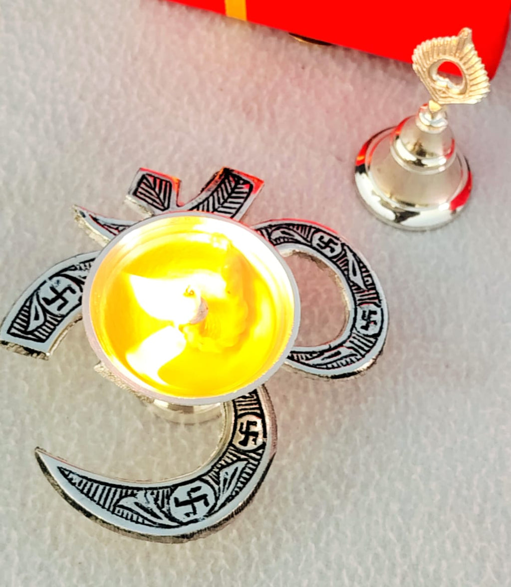 German Silver Combo of Om Diya with Bell La Vie Bien German Silver Combo of Om Diya with Bell