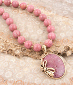 Gifted Pink Rhodonite Gold Bow Beaded Pendant Necklace by Barse Jewelry