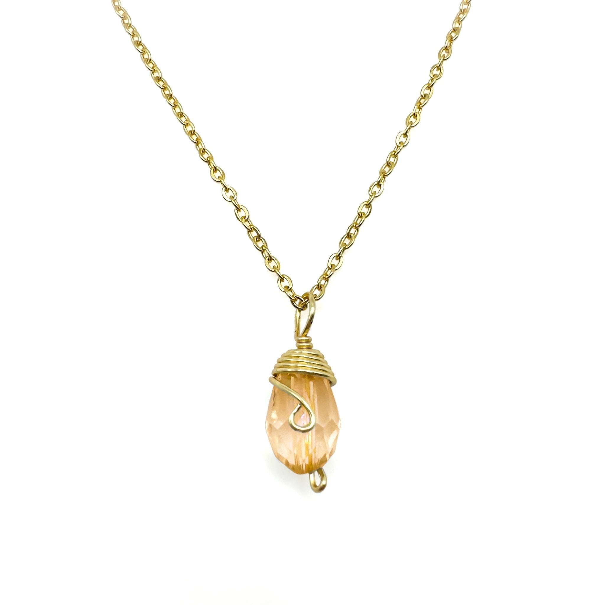 Gold Birthstone necklace by Alegria Accessories Inc