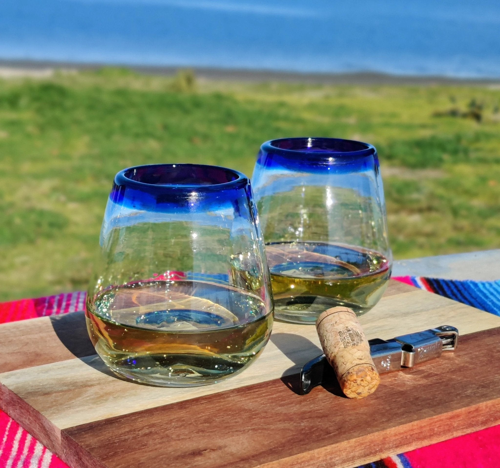 Hand Blown Mexican Stemless Wine Glasses - Set of 6 Glasses with Cobalt Blue Rims (15 oz) by Dos Sueños