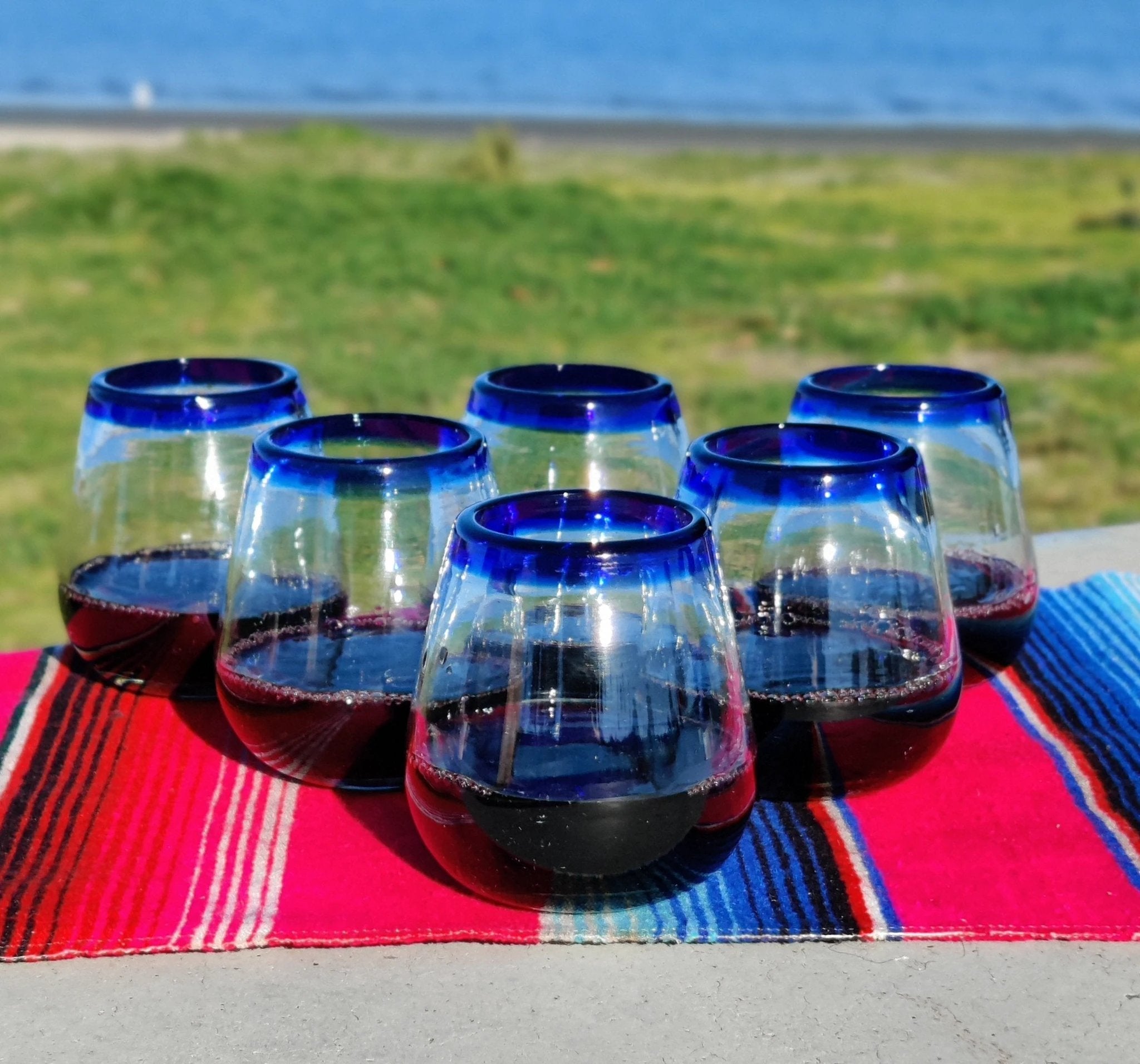 Hand Blown Mexican Stemless Wine Glasses - Set of 6 Glasses with Cobalt Blue Rims (15 oz) by Dos Sueños