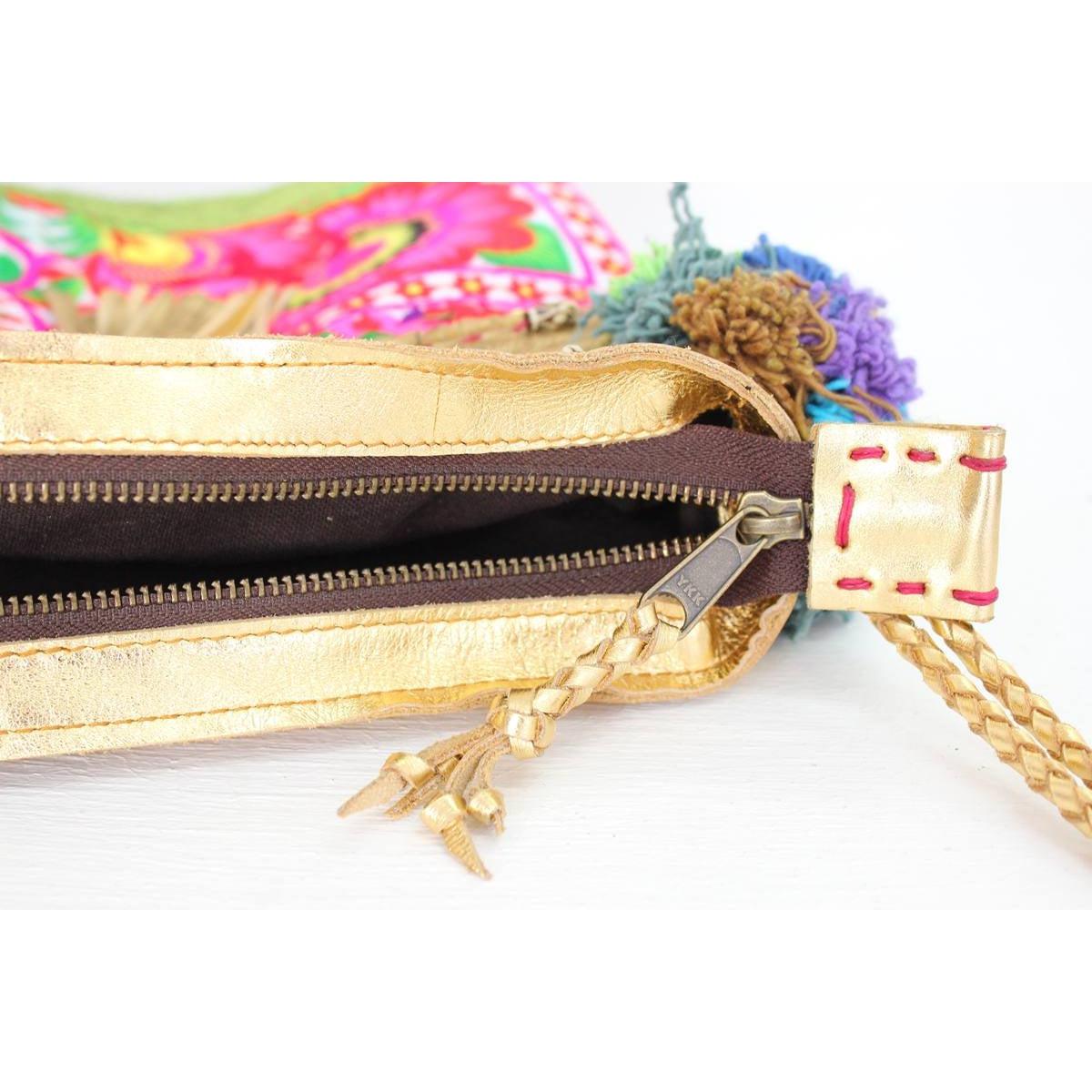 Handmade Gold Leather Crossbody Bag with Hmong Textile, Boho Pom Pom Tassel Purse, Tribal Ethnic Fair Trade Bag from Thailand Bags La Vie Bien Handmade Gold Leather Crossbody Bag with Hmong Textile, Boho Pom Pom Tassel Purse, Tribal Ethnic Fair Trade Bag from Thailand