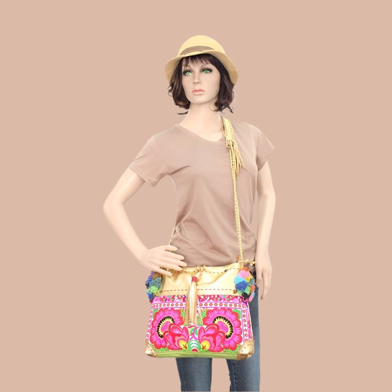 Handmade Gold Leather Crossbody Bag with Hmong Textile, Boho Pom Pom Tassel Purse, Tribal Ethnic Fair Trade Bag from Thailand Bags La Vie Bien Handmade Gold Leather Crossbody Bag with Hmong Textile, Boho Pom Pom Tassel Purse, Tribal Ethnic Fair Trade Bag from Thailand