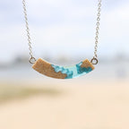 Headland Necklace – Aqua Resin & Sand Arc Pendant La Vie Bien Headland Necklace – Aqua Resin & Sand Arc Pendant