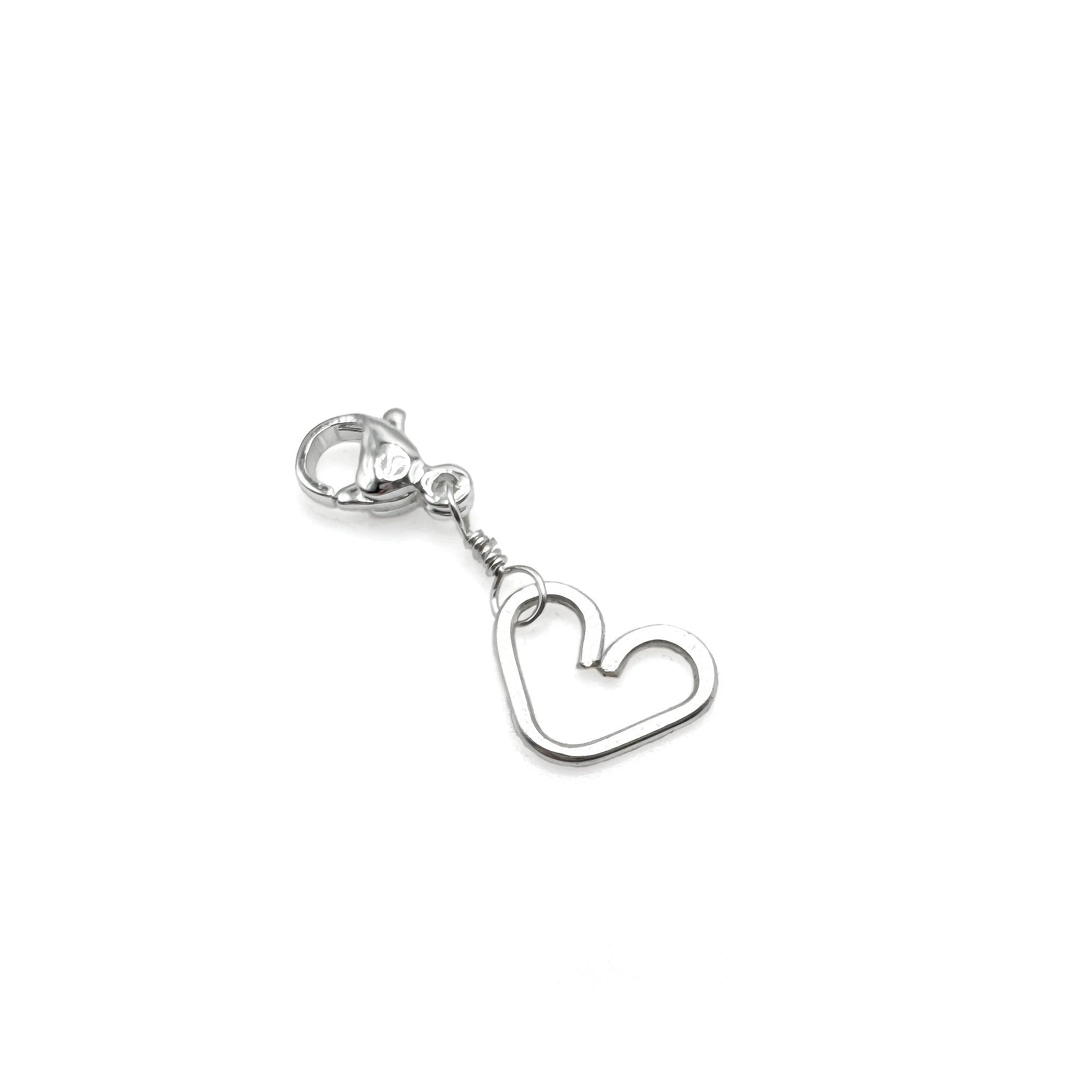 Heart silver charm by Alegria Accessories Inc