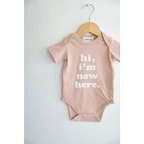 Hi, I'm New Here in Rose Organic Cotton Baby Onesie