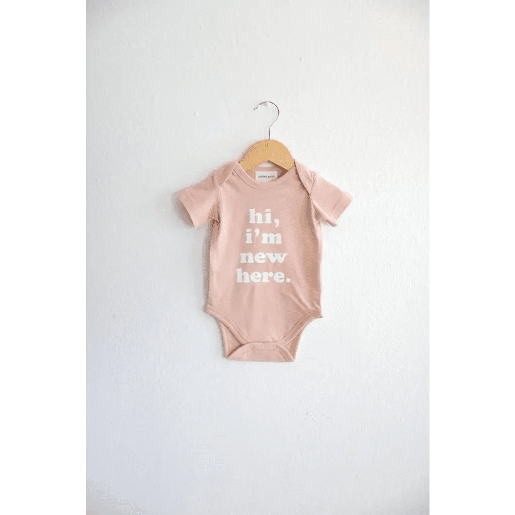 Hi, I'm New Here in Rose Organic Cotton Baby Onesie