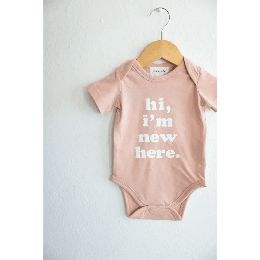 Hi, I'm New Here in Rose Organic Cotton Baby Onesie