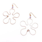 Hibiscus gold earrings by Alegria Accessories Inc