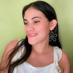 Hibiscus silver earrings by Alegria Accessories Inc