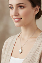 Oval Claddagh Locket Necklace in Sterling Silver