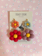 Rainbow Daisy Dangle Earrings by honeyloomdesigns