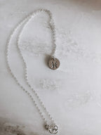 Astrology Hand Stamped Coin Necklace by Derive Jewelry
