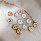 Astrology Hand Stamped Coin Necklace by Derive Jewelry