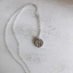 Astrology Hand Stamped Coin Necklace by Derive Jewelry