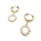 Infinity earrings by Alegria Accessories Inc