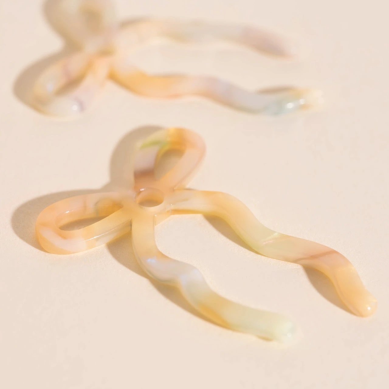 Iridescent Acrylic Bow Hoop Charms by Oh Clementine