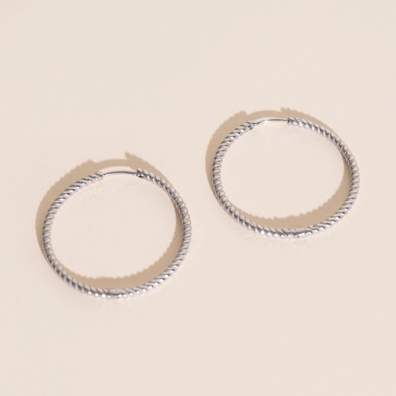 Lasso Rope Rounded Huggie Hoop Earrings by Oh Clementine