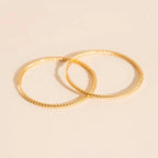 Lasso Rope Rounded Huggie Hoop Earrings by Oh Clementine