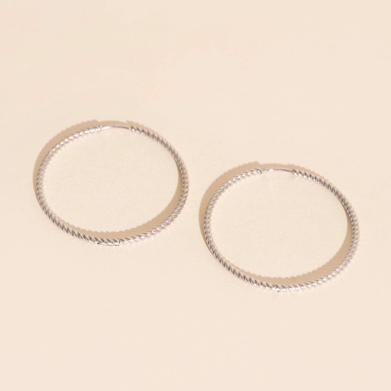 Lasso Rope Rounded Huggie Hoop Earrings by Oh Clementine
