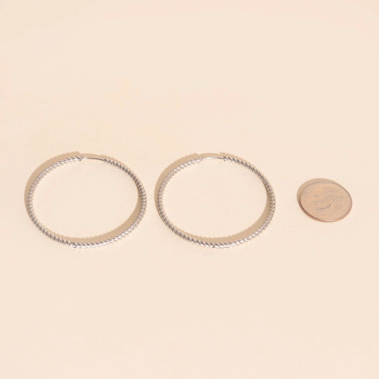 Lasso Rope Rounded Huggie Hoop Earrings by Oh Clementine