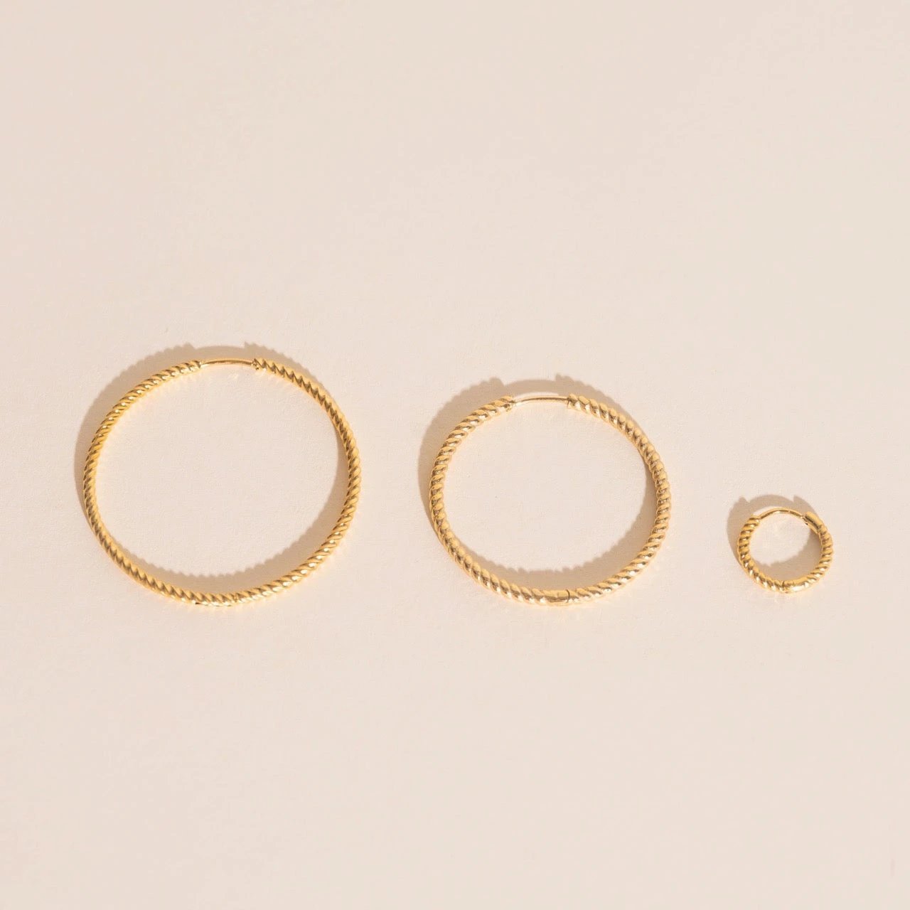 Lasso Rope Rounded Huggie Hoop Earrings by Oh Clementine