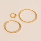 Lasso Rope Rounded Huggie Hoop Earrings by Oh Clementine